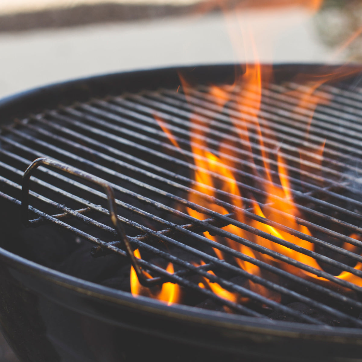 CharBoy's bourbon chicken char-grilling over open flame