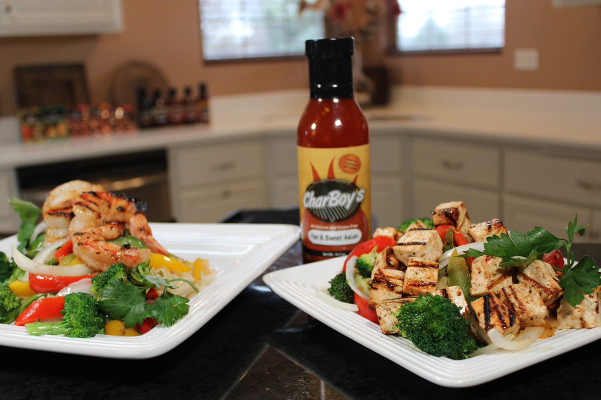 CharBoy's Hot & Sweet Asian Sauce with grilled shrimp and tofu stir-fry over rice and vegetables