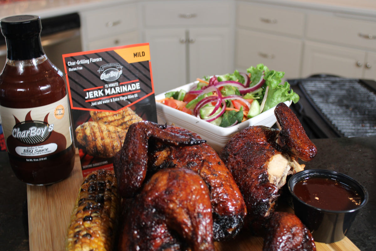 CharBoy's Southern BBQ Sauce with whole char-grilled chicken, corn and salad